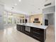 This kitchen island offers a stainless steel dishwasher, sink, and plenty of storage space at 713 Argyle Pl, Temple Terrace, FL 33617