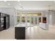 A kitchen view reveals large windows at 713 Argyle Pl, Temple Terrace, FL 33617