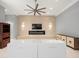 Living room featuring tiled accent wall, modern fireplace, and ceiling fan at 713 Argyle Pl, Temple Terrace, FL 33617