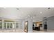 Spacious living room showcasing tile flooring, and open access to gourmet kitchen at 713 Argyle Pl, Temple Terrace, FL 33617