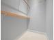 Spacious walk-in closet with installed shelving, providing ample storage solutions at 713 Argyle Pl, Temple Terrace, FL 33617