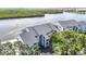 Desirable waterfront condo community with mature trees, tranquil setting, and boating access to the Gulf at 809 Bahia Del Sol Dr # 72, Ruskin, FL 33570