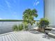 Outdoor space with palm trees and lush greenery creating a serene waterfront oasis at 809 Bahia Del Sol Dr # 72, Ruskin, FL 33570