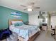 Comfortable bedroom with blue accents, closet space, and cozy decor at 809 Bahia Del Sol Dr # 72, Ruskin, FL 33570
