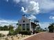 Charming Little Harbor clubhouse with lush landscaping and a brick-paved walkway at 809 Bahia Del Sol Dr # 72, Ruskin, FL 33570