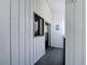 Inviting entryway with white wood paneling and decor, showcasing the home's coastal charm at 809 Bahia Del Sol Dr # 72, Ruskin, FL 33570