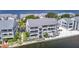 Charming waterfront condo complex with private balconies, outdoor seating, and stunning water views at 809 Bahia Del Sol Dr # 72, Ruskin, FL 33570