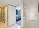 Bright hallway showing access to bathroom and bedroom, with tiled floors and ample lighting at 809 Bahia Del Sol Dr # 72, Ruskin, FL 33570