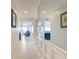 Bright hallway with tile flooring, showcasing open layout and access to living spaces at 809 Bahia Del Sol Dr # 72, Ruskin, FL 33570