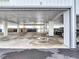 View of a condo's covered parking with room for multiple vehicles and storage at 809 Bahia Del Sol Dr # 72, Ruskin, FL 33570