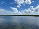 Scenic water view from the condo complex with lush greenery and clear skies at 809 Bahia Del Sol Dr # 72, Ruskin, FL 33570