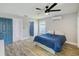 Bedroom with 2 entrances and laminate floors at 9027 Merrimoor Blvd, Seminole, FL 33777