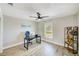 Office with a desk and computer and a bookcase at 9027 Merrimoor Blvd, Seminole, FL 33777