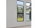 Bright bedroom featuring large windows and neutral colors, offering natural light and views at 937 Old Welcome Rd, Lithia, FL 33547