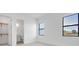Bright bedroom with closet and an en-suite bathroom offering additional privacy at 937 Old Welcome Rd, Lithia, FL 33547