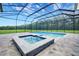 Backyard pool and spa enclosed with screen, offering privacy and a bug-free environment at 937 Old Welcome Rd, Lithia, FL 33547