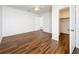 Spacious bedroom featuring modern ceiling fan, wood floors, and attached closet at 1011 Newton S Ave, St Petersburg, FL 33705