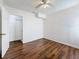 Bedroom boasts wood floors, a ceiling fan, and closet at 1011 Newton S Ave, St Petersburg, FL 33705