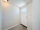 Bright and inviting entryway of a home with a windowed front door at 1011 Newton S Ave, St Petersburg, FL 33705