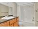 Bathroom with a bathtub and a vanity with one sink at 10330 Carrollwood Ln # 95, Tampa, FL 33618