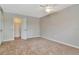 A bedroom with a ceiling fan and closet at 10330 Carrollwood Ln # 95, Tampa, FL 33618