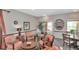 Comfortable common area featuring cozy seating, a round table, and tasteful decor for relaxation at 10330 Carrollwood Ln # 95, Tampa, FL 33618