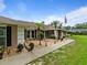 Charming single-story home with well-maintained landscaping, stone mulch, and a welcoming walkway at 10502 Lake Williams Dr, Odessa, FL 33556
