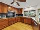 Well-appointed kitchen featuring stainless steel appliances and granite countertops at 10502 Lake Williams Dr, Odessa, FL 33556