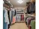 Large walk-in closet with professionally installed shelving and racks to maximize your storage potential at 10502 Lake Williams Dr, Odessa, FL 33556