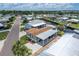 Aerial view of canal-front neighborhood with community pool at 108 W Saint Annes Cir, Apollo Beach, FL 33572