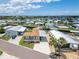 Aerial view showing a well-maintained neighborhood with private drives and landscaping at 108 W Saint Annes Cir, Apollo Beach, FL 33572