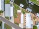 Aerial view of neighborhood homes along the canal at 108 W Saint Annes Cir, Apollo Beach, FL 33572