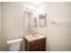 Cozy bathroom featuring a vanity with light countertop and dark wood cabinet at 11132 Creek Haven Dr, Riverview, FL 33569
