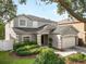 Charming two-story home with well-maintained landscaping and an attached two car garage at 11132 Creek Haven Dr, Riverview, FL 33569