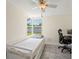 Comfortable bedroom with a large window providing natural light for an optimal space at 11829 104Th St, Largo, FL 33773