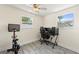 Charming bedroom with lots of natural light and plank floors, perfect for a home office or guest room at 11829 104Th St, Largo, FL 33773