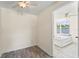 Empty bedroom with a window and ceiling fan, providing a blank canvas for personalization at 11829 104Th St, Largo, FL 33773