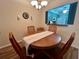 Cozy dining area adjacent to the kitchen, perfect for Gathering meals at 1286 Mission Hills Blvd, Clearwater, FL 33759