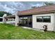 Charming exterior view of home with carport and covered entry at 1286 Mission Hills Blvd, Clearwater, FL 33759