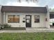 Charming single story home with simple landscaping and designated parking at 1286 Mission Hills Blvd, Clearwater, FL 33759