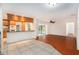 Modern kitchen with breakfast bar overlooking the living area and access to the outdoor pool at 13310 Golf Crest Cir, Tampa, FL 33618