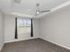 Bedroom featuring neutral walls, carpet flooring, and ceiling fan at 1613 Cabbage Key Dr, Ruskin, FL 33570