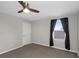 Bedroom with neutral paint and carpet with a view from a window at 1613 Cabbage Key Dr, Ruskin, FL 33570