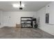 Spacious garage with ample storage space, shelving, and a clean, organized layout at 1613 Cabbage Key Dr, Ruskin, FL 33570