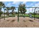 Community playground showcasing swings for various ages in a Gathering-friendly environment at 1613 Cabbage Key Dr, Ruskin, FL 33570