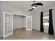 Versatile room with French doors, a ceiling fan, and a view of the outdoors at 1613 Cabbage Key Dr, Ruskin, FL 33570