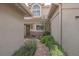 Charming courtyard entry with decorative fountain and brick-paved walkway at 17735 Oak Bridge St, Tampa, FL 33647