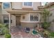 Attractive courtyard entrance with mature landscaping and a welcoming front door at 17735 Oak Bridge St, Tampa, FL 33647