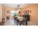 Inviting dining room with modern lighting, table, and chairs next to the front door at 17735 Oak Bridge St, Tampa, FL 33647