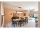 Dining room area offering a view into the bright and airy living room at 17735 Oak Bridge St, Tampa, FL 33647